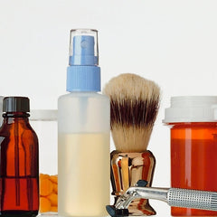 Collection of grooming products including razors, lotions, and grooming tools for personal care.